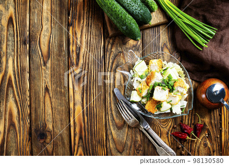 Fish dish - fried fish fillet with vegetables on glass plate 98130580