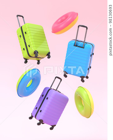 Colorful suitcase and inflatable ring flying on pink background, summer vacation Colorful suitcase and inflatable ring flying on pink background, summer vacation 98130693