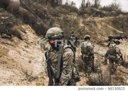 Group of soldiers on a shooting range Group of soldiers on a shooting range 98130825