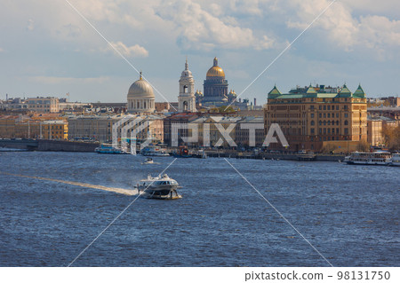 high-speed tourist ship in city for tourists. urban, river and ship water transport. high-speed tourist ship in city for tourists. urban, river and ship water transport. 98131750