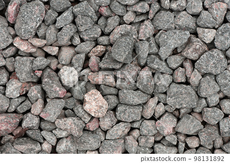 Pile of rubble top view. Top view of gravel or stone. Backdrop of the gray gravel cobblestones. Stone background. Extreme closeup. Pile of rubble top view. Top view of gravel or stone. Backdrop of the gray gravel cobblestones. Stone background. Extreme closeup. 98131892
