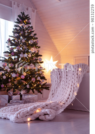 Scandinavian Christmas. New Year fir tree with pastel color balls 98132259