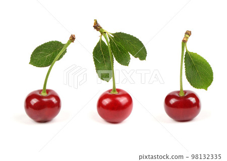 Collection of cherries with green leaf isolated on white background, side view. Extrem close-up. Collection of cherries with green leaf isolated on white background, side view. Extrem close-up. 98132335