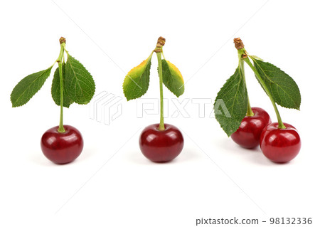 Collection of cherries with green leaf isolated on white background, side view. Extrem close-up. Collection of cherries with green leaf isolated on white background, side view. Extrem close-up. 98132336