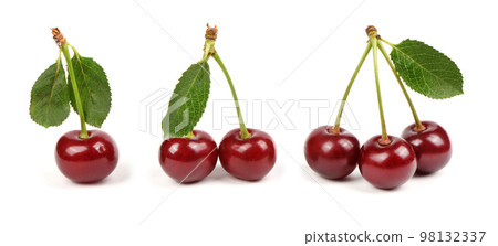 Collection of cherries with green leaf isolated on white background, side view. Extrem close-up. Collection of cherries with green leaf isolated on white background, side view. Extrem close-up. 98132337