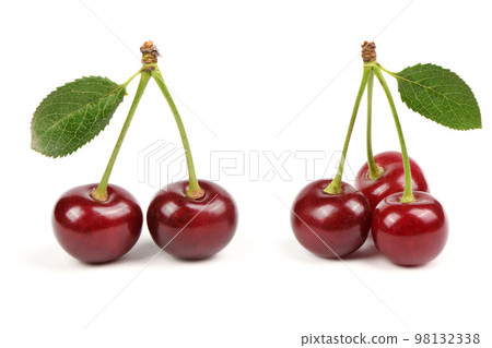 Collection of cherries with green leaf isolated on white background, side view. Extrem close-up. Collection of cherries with green leaf isolated on white background, side view. Extrem close-up. 98132338