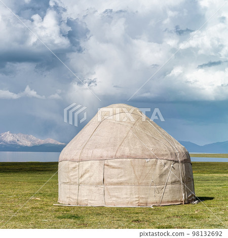 Traditional Yurt tent at the Song Kul lake plateau in Kyrgyzstan. Yurt tents are traditional, portable tents made of felt that are used as a form of accommodation in the country. 98132692