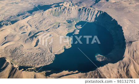 Nemrut Crater at the top of Mount Nemrut, an inactive stratovolcano. Lake Nemrut inside the caldera has a turquoise color, which is caused by the minerals in the water. 98132701