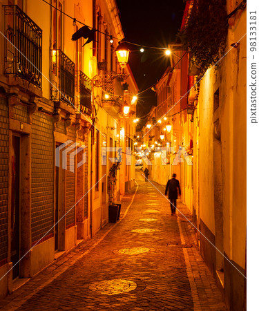 Illuminated night old street Porto 98133181