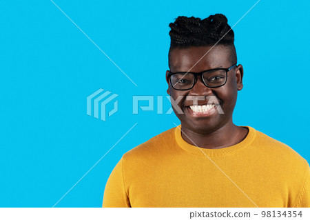 Closeup Portrait Of Happy Young Black Man Wearing Stylish Eyeglasses Closeup Portrait Of Happy Young Black Man Wearing Stylish Eyeglasses 98134354