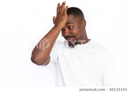 Amazed young man facepalm Amazed young man facepalm 98135324
