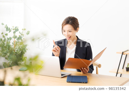 woman working in a suit 98135342