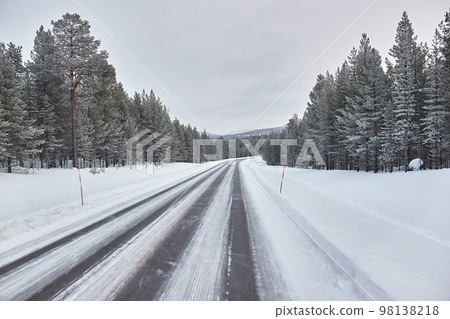 Snowy road winter driving Snowy road winter driving 98138218