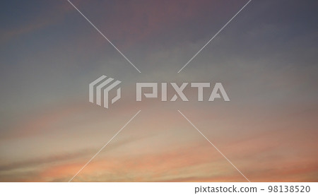 Gold color cloud and blue sky in magic hour at sunset, The horizon began to turn orange with purple clouds at night, Dramatic cloudscape area Gold color cloud and blue sky in magic hour at sunset, The horizon began to turn orange with purple clouds at night, Dramatic cloudscape area 98138520
