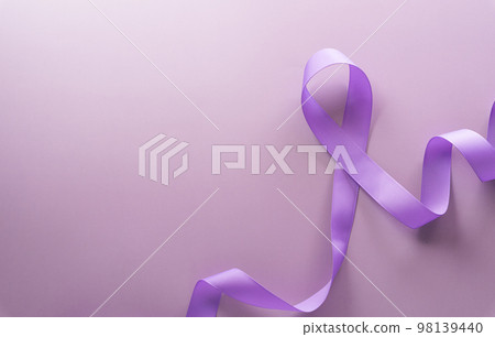 Purple ribbon on pastel paper background for supporting World Cancer Day campaign on February 4. Purple ribbon on pastel paper background for supporting World Cancer Day campaign on February 4. 98139440