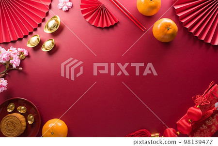 Chinese new year decorations made from red packet, orange and gold ingots or golden lump. Chinese characters on the object means to fortune, good luck, wealth, and money flow. Chinese new year decorations made from red packet, orange and gold ingots or golden lump. Chinese characters on the object means to fortune, good luck, wealth, and money flow. 98139477
