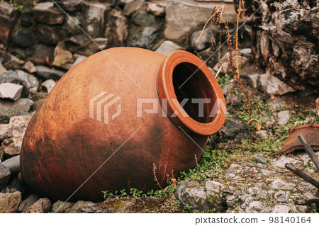 old Abandoned Kvevri on Ground. The Large Earthenware Vessel Used For The Fermentation, Storage And Ageing Of Traditional Georgian Wine 98140164