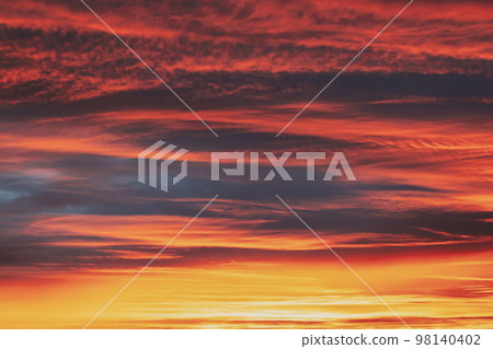 Abstract Saturated Orange-yellow Colors Of Clouds. Unusual Sky Background. Rich Orange Colors. Toned Pink-yellow Clouds. Sky Sunset Sunrise Background. Cloudy Sky. Sunny Cloudscape 98140402