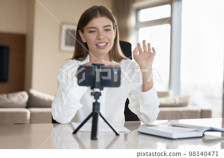 Attractive woman staring at cellphone screen start streaming Attractive woman staring at cellphone screen start streaming 98140471