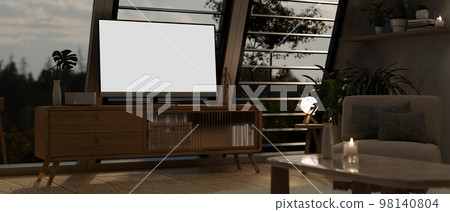 Television blank screen mockup on minimal wood TV cabinet in comfortable home living room Television blank screen mockup on minimal wood TV cabinet in comfortable home living room 98140804