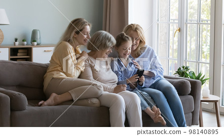 Happy little daughter kid, young mom, middle aged grandma Happy little daughter kid, young mom, middle aged grandma 98140895