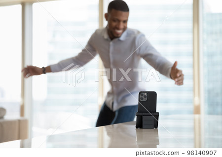 African man vlogger records his dance on cellphone camera 98140907