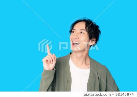 A man pointing up A man pointing up 98143974