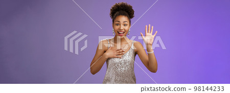 Charming nice young african-american elegant woman meet familiar person greeting raise hand waving press palm chest smiling broadly say name, swearing tell truth, standing promise not lie Charming nice young african-american elegant woman meet familiar person greeting raise hand waving press palm chest smiling broadly say name, swearing tell truth, standing promise not lie 98144233