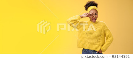 Friendly self-assured energetic african-american smiling healthy girl winking positive attitude grinning cheerful show peace victory lucky gesture hold hand waist confident, yellow background Friendly self-assured energetic african-american smiling healthy girl winking positive attitude grinning cheerful show peace victory lucky gesture hold hand waist confident, yellow background 98144591