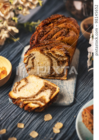 Twisted babka with walnuts Twisted babka with walnuts 98145652