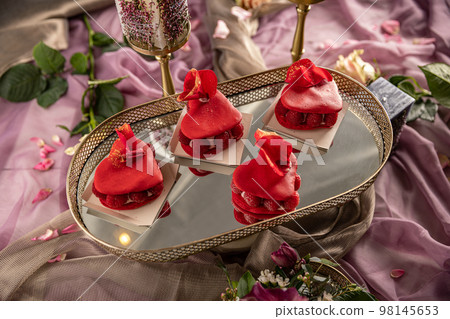 Heart shaped ispahan macaron cake Heart shaped ispahan macaron cake 98145653