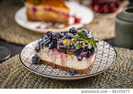 Cheesecake tart with fresh blueberries Cheesecake tart with fresh blueberries 98145677