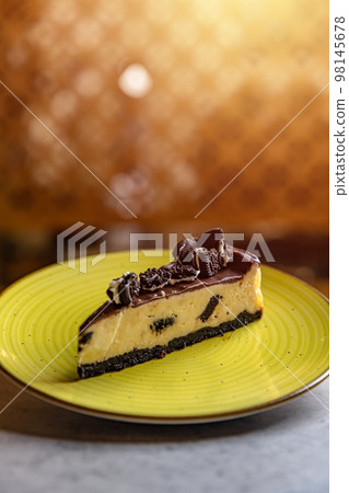 Tasty cheesecake with chocolate cookies Tasty cheesecake with chocolate cookies 98145678