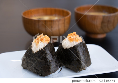 Salmon rice ball and miso soup for breakfast 98146274