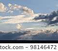 sky landscape with white clouds and black clouds 98146472