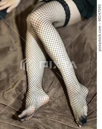 Fishnet tights of a woman with outstanding - Stock Photo [98147093] -  PIXTA