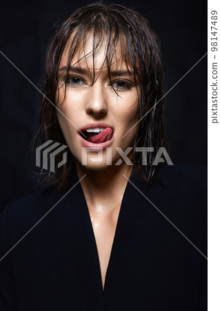 Happy smiling young woman with Wet Hair. Beautiful laughing Lady Happy smiling young woman with Wet Hair. Beautiful laughing Lady 98147489