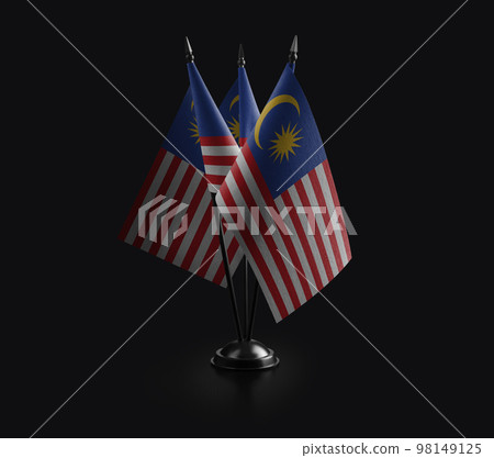 Small national flags of the Malaysia on a black background 98149125
