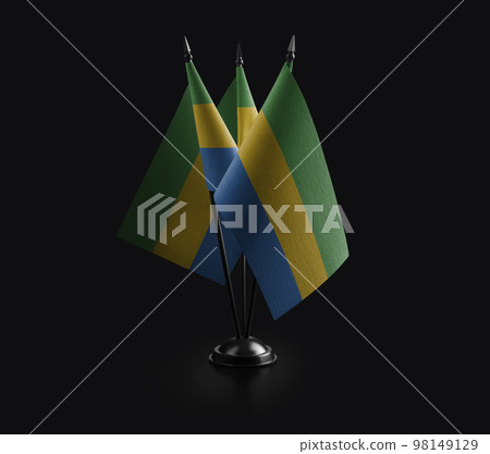 Small national flags of the Gabon on a black background 98149129