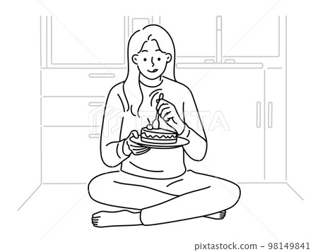 Woman sit on floor eat chocolate cake Woman sit on floor eat chocolate cake 98149841