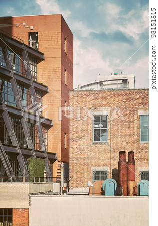 Urban scene with rusty exhaust pipes, color toning applied, New York City, USA. 98151815