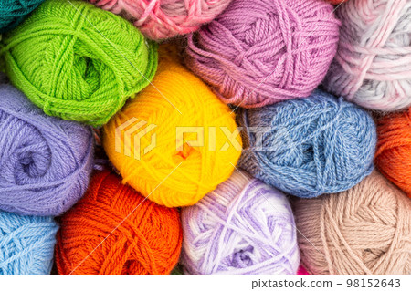 Stack of knitting yarn clews 98152643