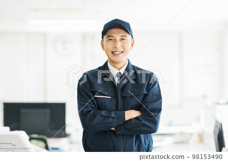 Portrait of a young man in work clothes 98153490
