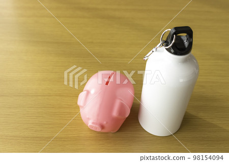 An image of latte money. water bottle and piggy bank 98154094