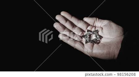 star of david with barbed wire in the hand of a man star of david with barbed wire in the hand of a man 98156208