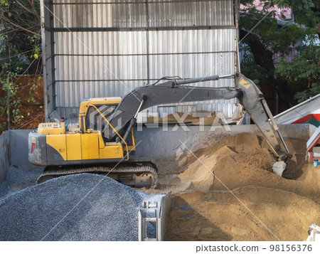 excavator in construction plant digging sand 98156376