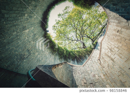 Spiral staircase at daytime in Fort Canning Park, Singapore 98158846