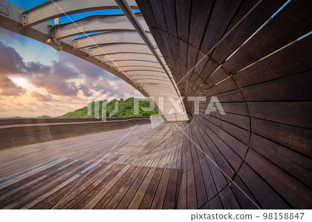 Henderson wave bridge on dramatic sky at sunset in Singapore. Henderson wave bridge on dramatic sky at sunset in Singapore. 98158847