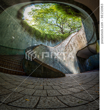 Spiral staircase at daytime in Fort Canning Park, Singapore Spiral staircase at daytime in Fort Canning Park, Singapore 98158963