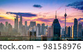 Cityscape of Kuala lumpur city skyline view on the roof top of hotel at sunrise in Malaysia. 98158976